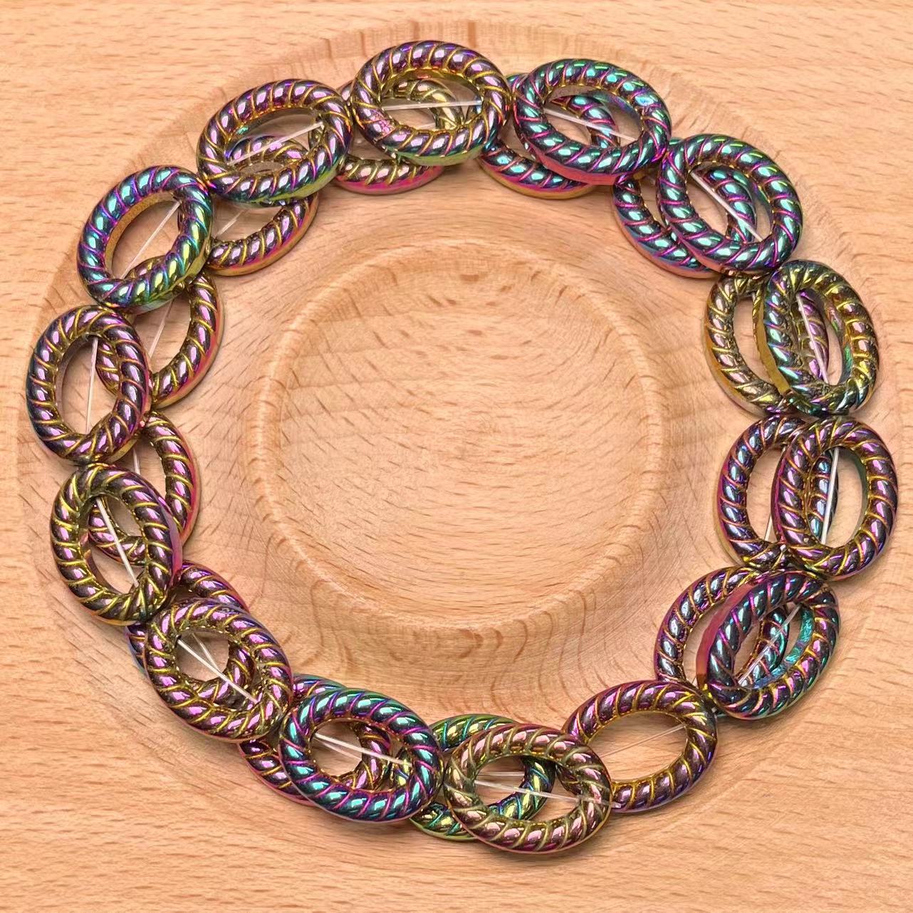 Aura Hematite Ripple circle bead strand 15mm 1pc