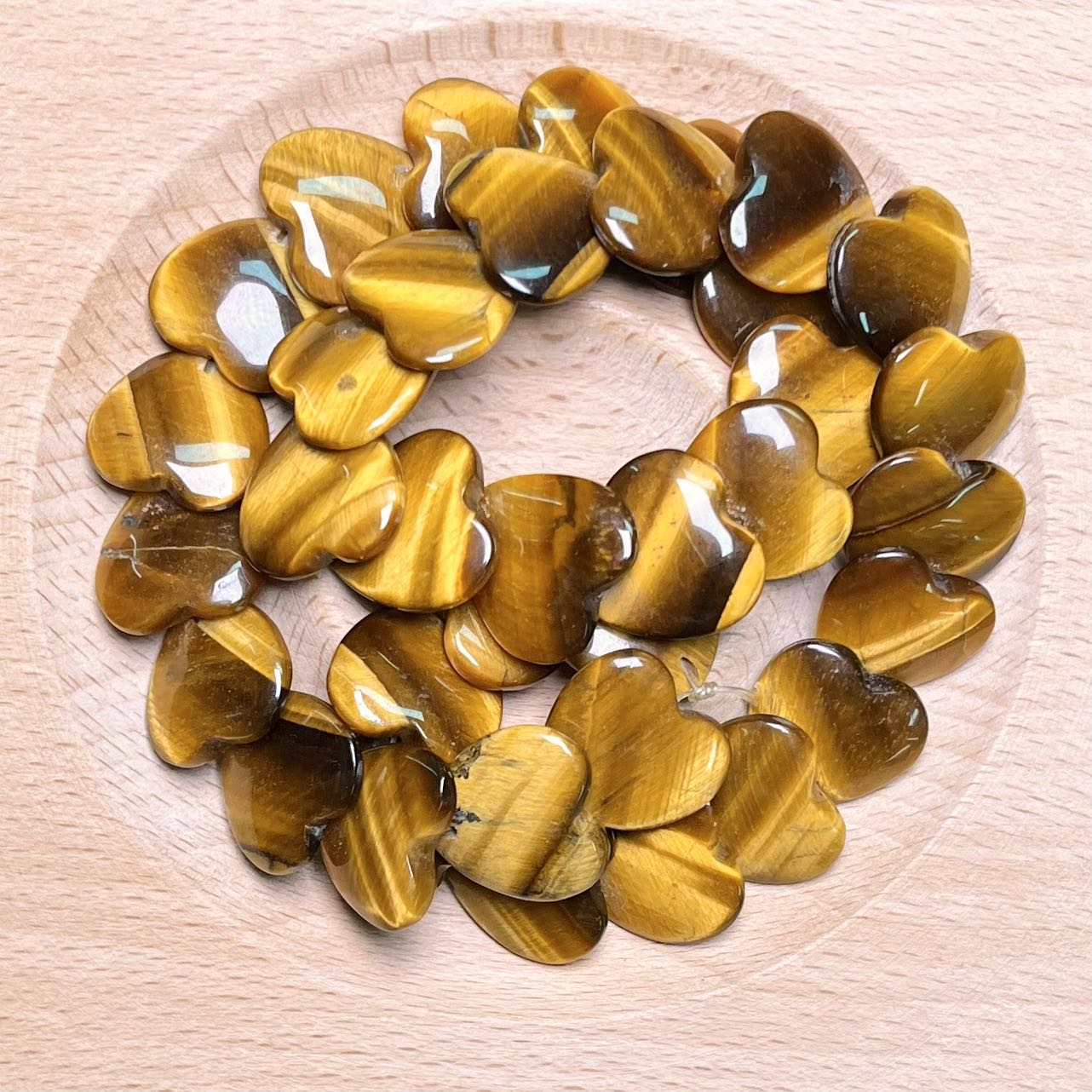 Tiger Eye heart carving bead strand 15mm